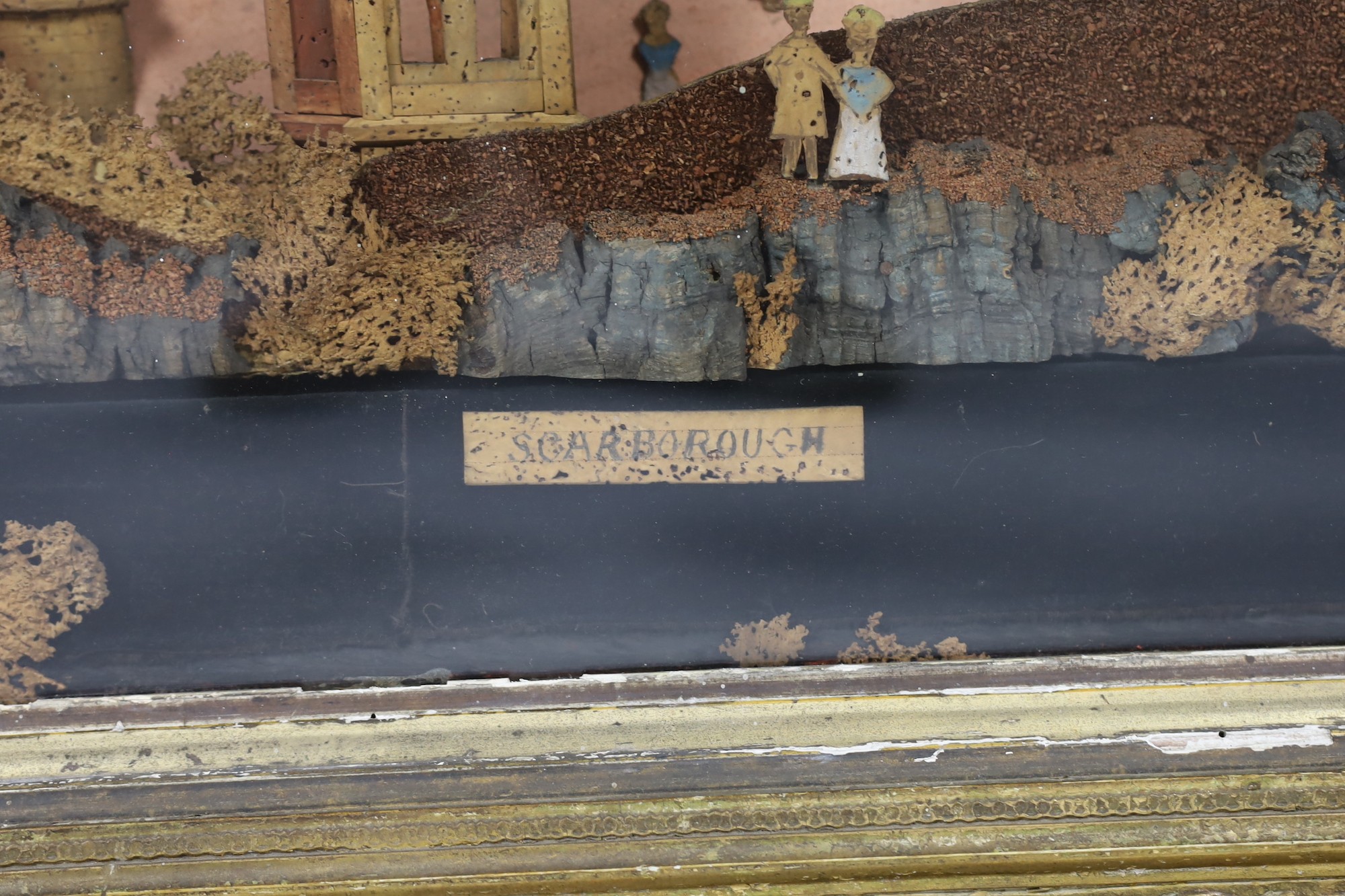 A large framed Victorian cork work panel depicting a view of Scarborough harbour, 93x124cm including frame overall 75 x 105cm